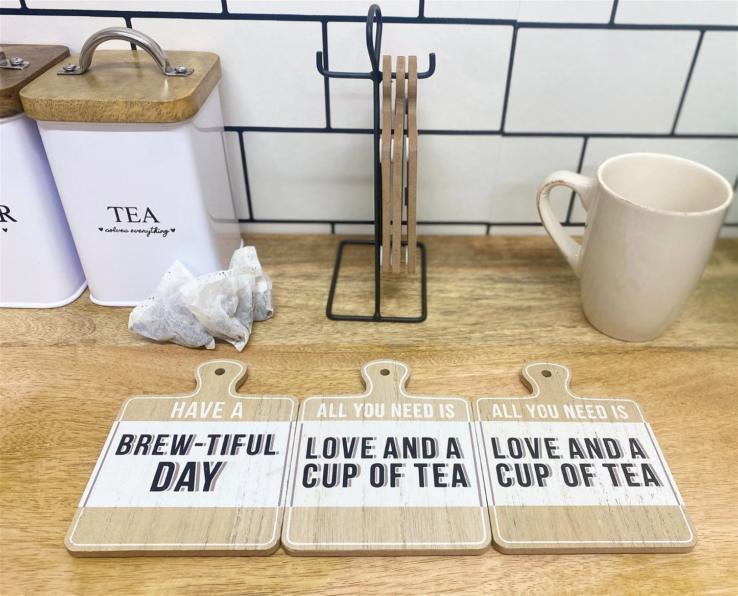 Set of Six Tea Slogan Coasters On Metal Stand